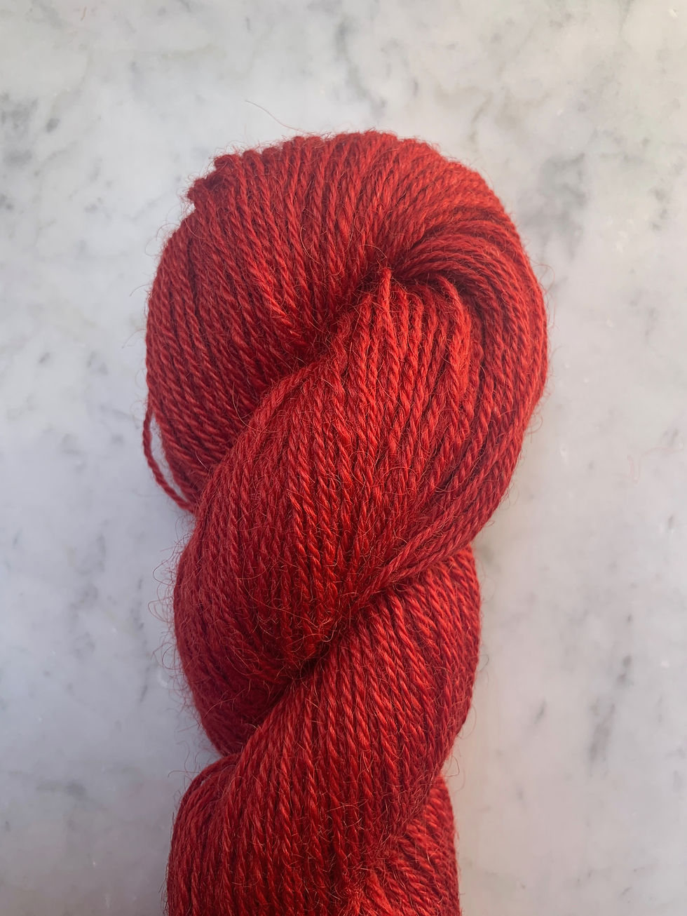 Thumbnail: Close Up of "Primrose" - Valais/Teeswater Wool Sport/Fingering 3ply Yarn Dyed Alizarin Red
