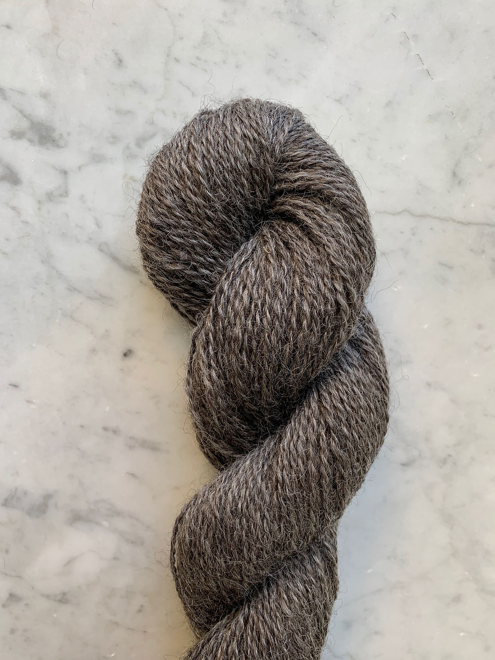 Close Up of "Silver Dust" - Wensleydale Wool Aran/Worsted/Bulky 2ply Yarn Natural Dark Gray