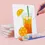 Thumbnail: Close-up of a hand painting an orange citrus drink canvas from paint by numbers set, with open paint pots.