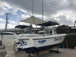 Boat shade for fishing vessel