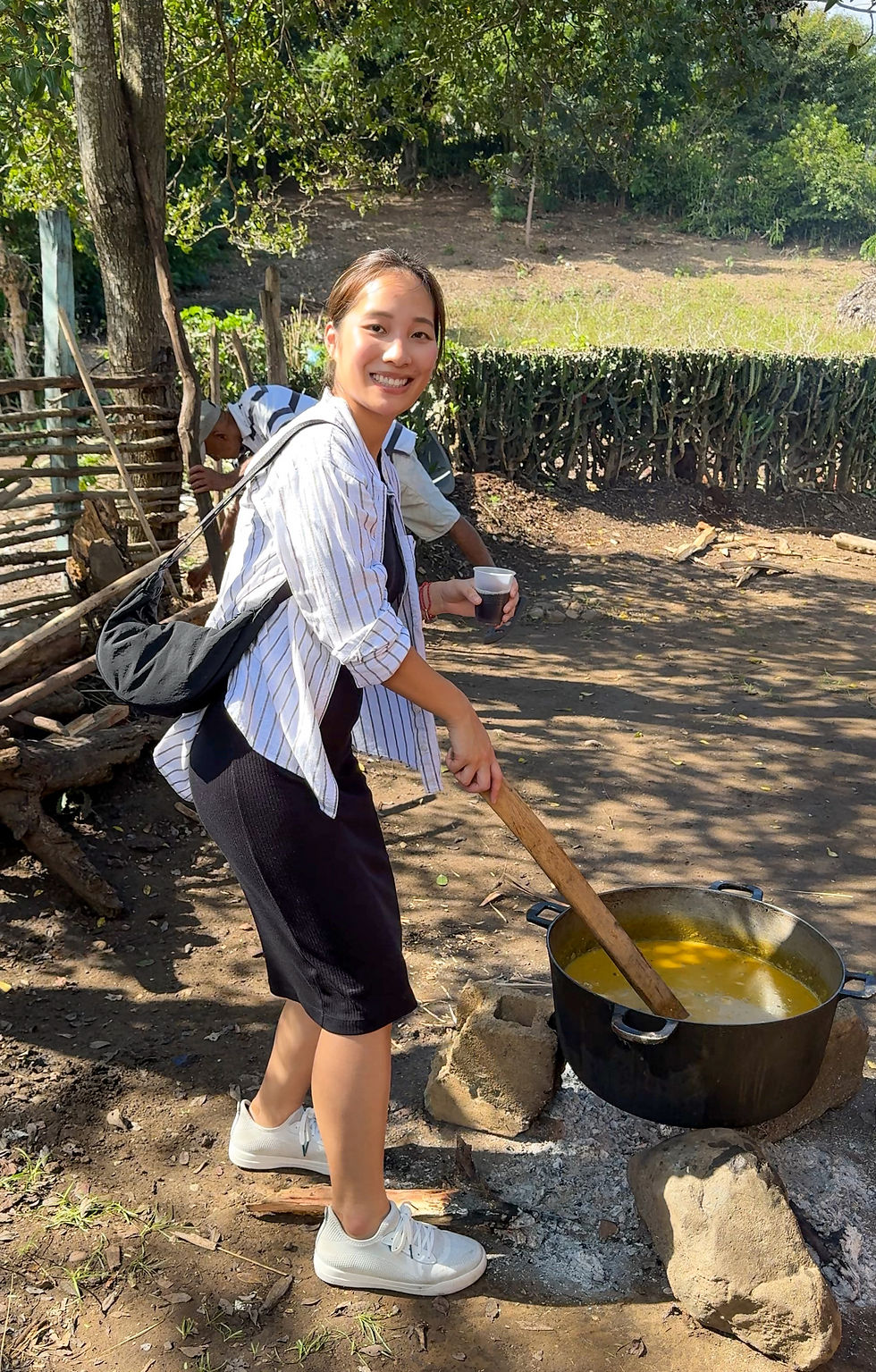 Wearing the Weekend Sneaker in Puerto Plata while making sancocho.