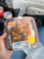 Hurricane Chicken Bento from 7/11 in a car.