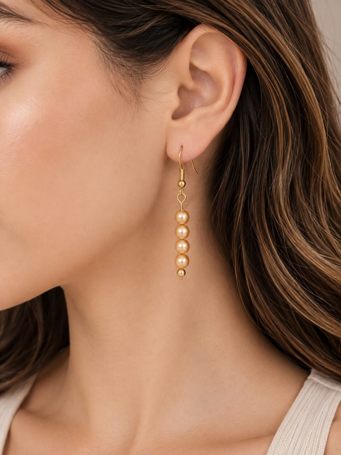 Golden Shell Pearl Dangle Earrings.
