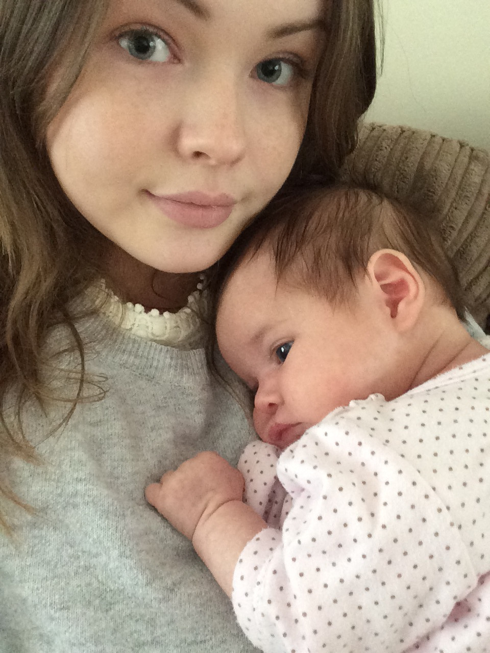 Megan holding her born sister Libby
