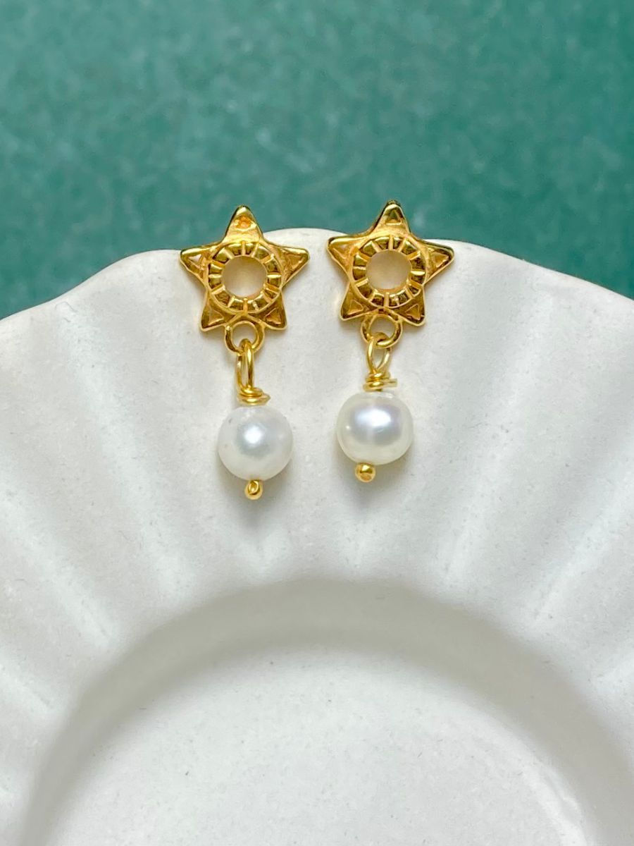 Thumbnail: gold star earrings