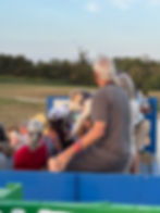 Enjoying the hayride with friends.