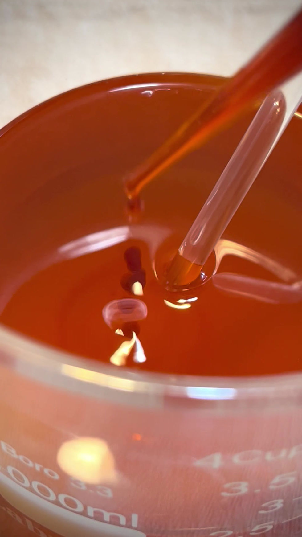 Thumbnail: Closeup of small-batch processing of Rose Gold Facial Oil highlighting natural ingredient infusion