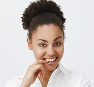 sassy-thoughtful-african-american-woman-smiling-pleased-pondering-great-business-idea (2).
