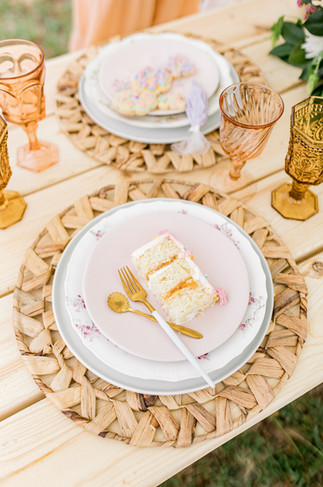 slice of birthday cake on vintage place setting