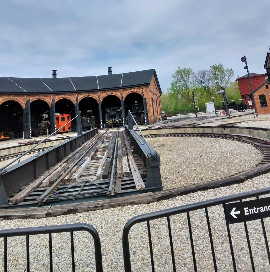 A Picture of their roundhouse which has trains they work on