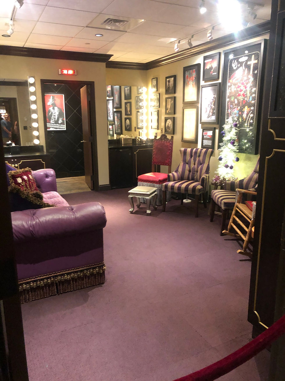 Its a Purple Room with a interesting Christmas tree