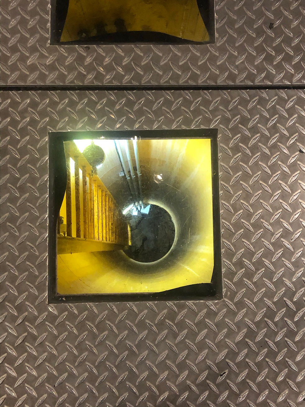 A window looking into the Sink Hole