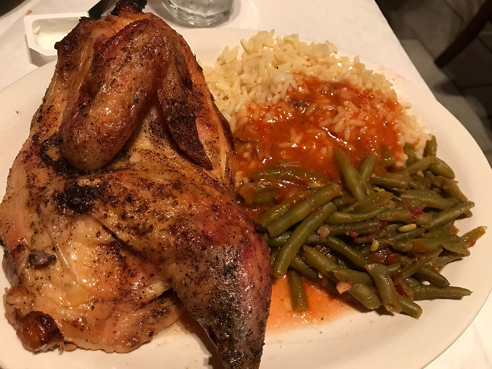 The Roasted Chicken, which featured a tender, half-roasted bird served with vegetables and a choice of potato or rice.