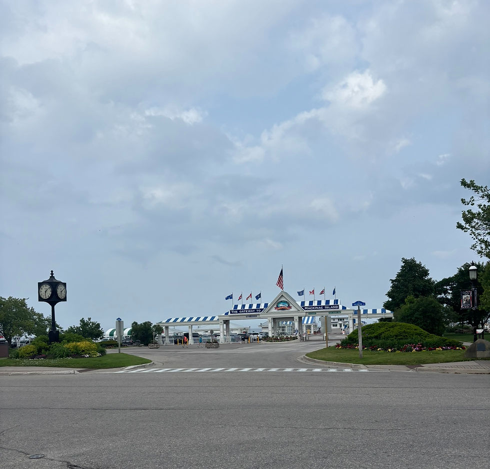 The Mackinaw Bay And The Mackinaw Island Ferry Is In The Distance