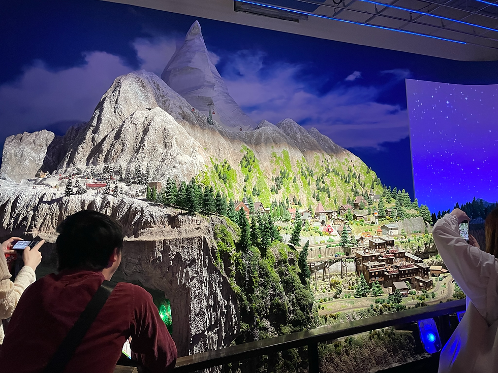 A Miniature Village With A Miniature Mountain!