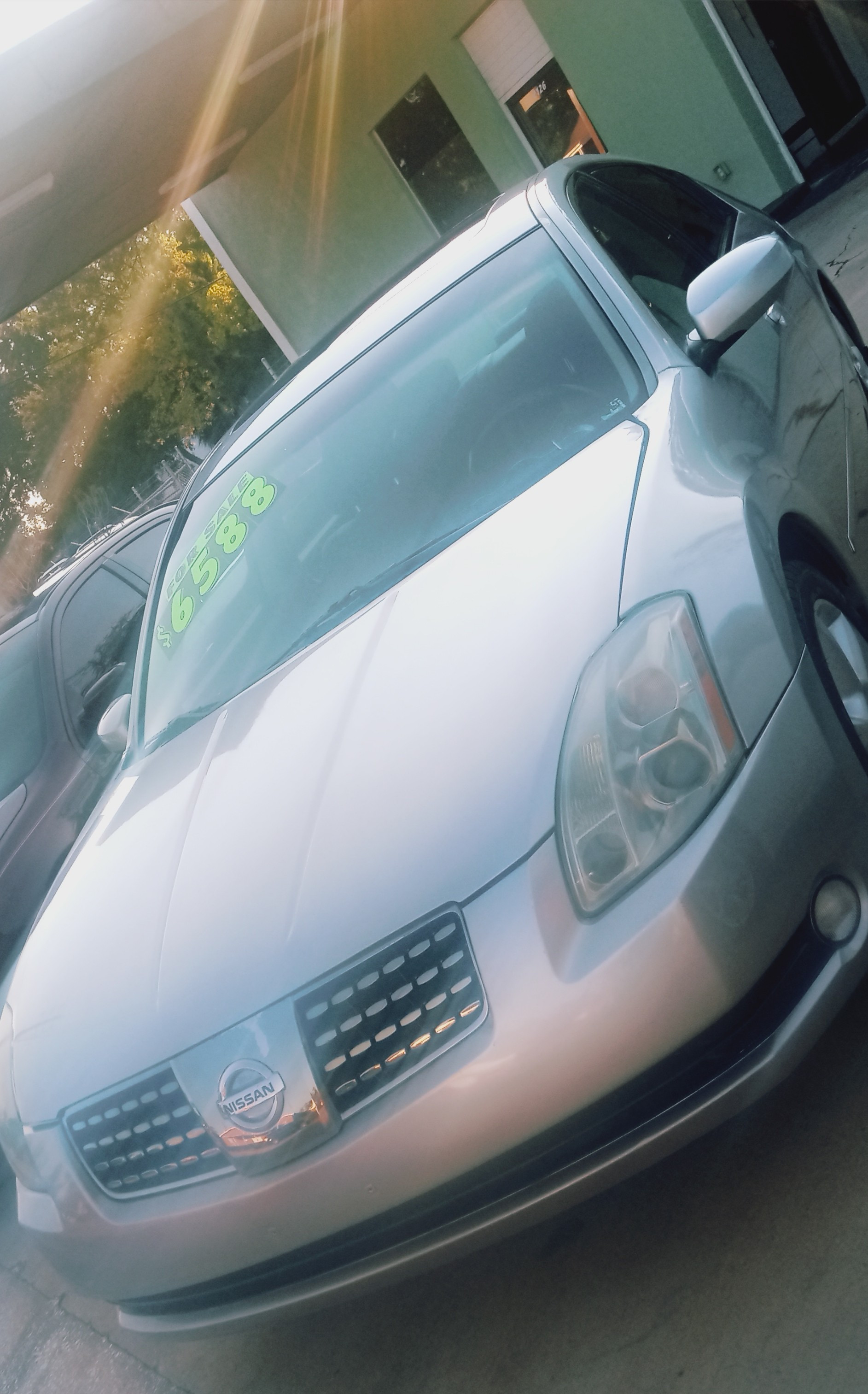 SILVER NISSAN MAXIMA