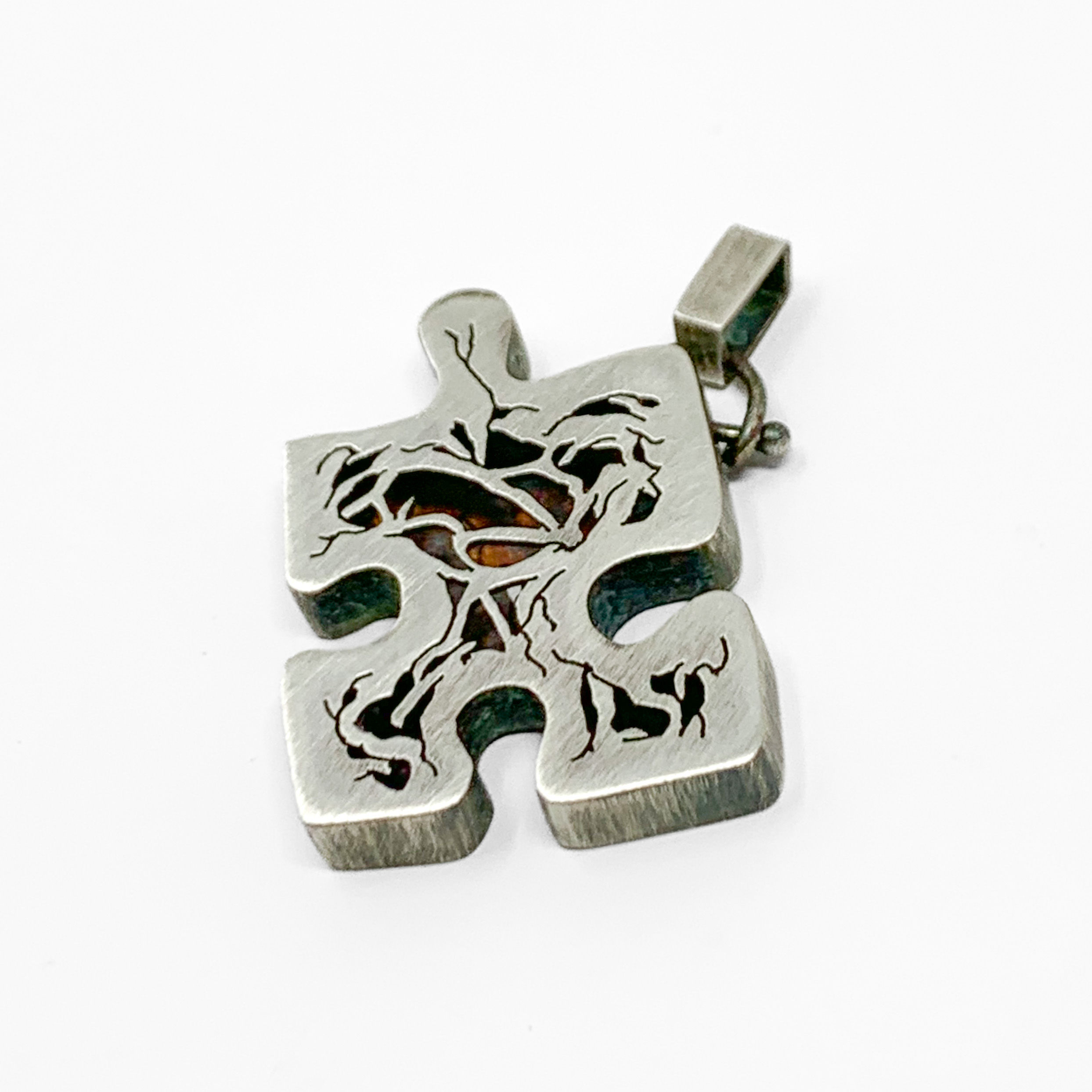 Surface Level: Puzzle Pendant 21