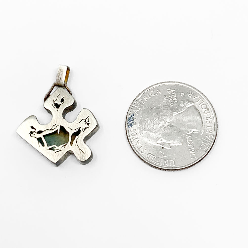 Thumbnail: Surface Level: Puzzle Pendant 19