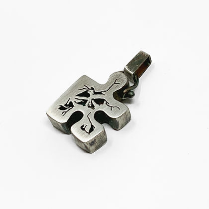 Surface Level: Puzzle Pendant 5