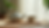 Eye-level view of a serene tea setup with a teapot and cup on a bamboo mat