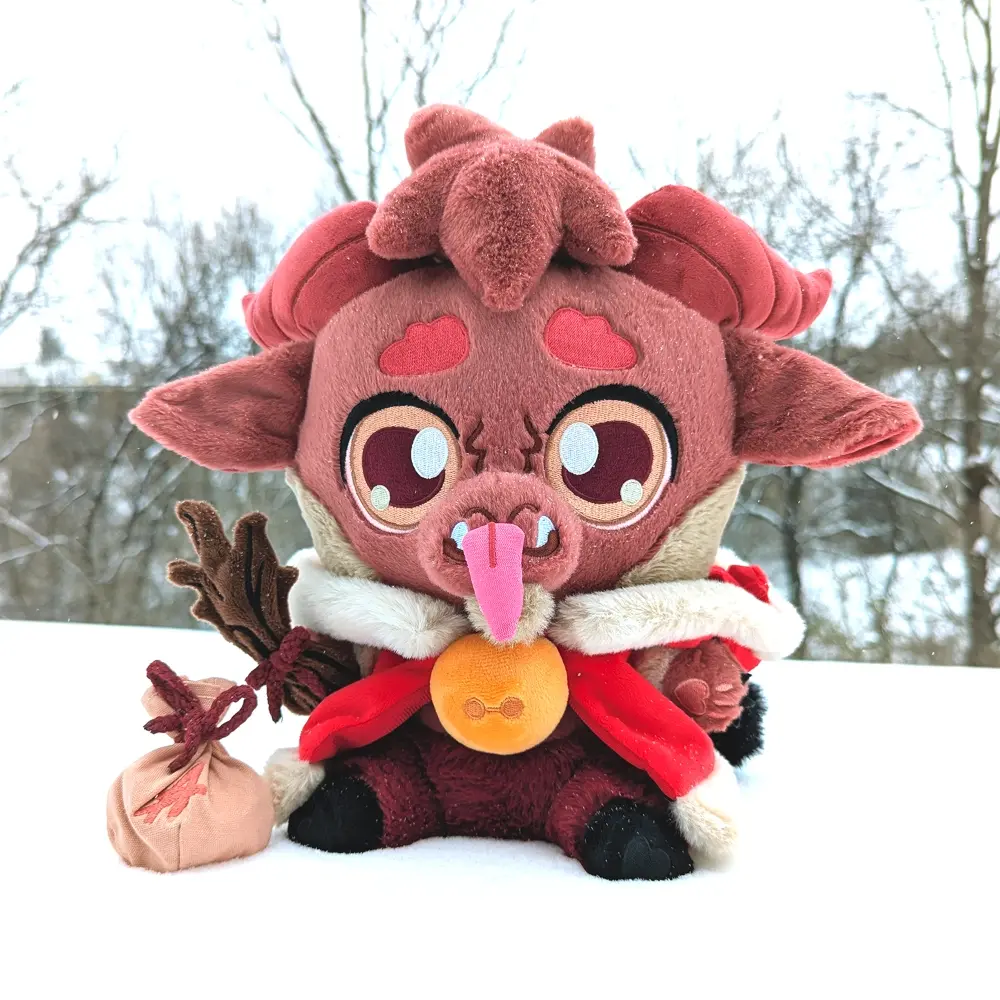 Brown Kidd Krampus Plush, Front View, Wearing cloak and other accessories including magnetic props