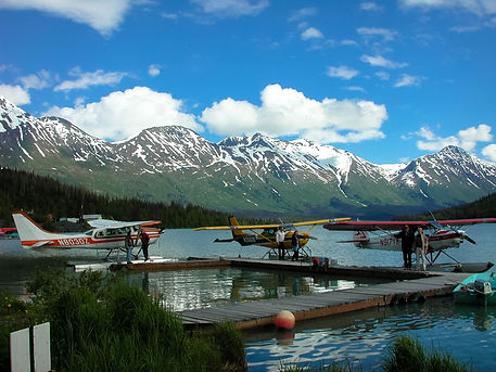 Here's all three Piper PA-18 Super Cubs on the dock in Moose Pass.