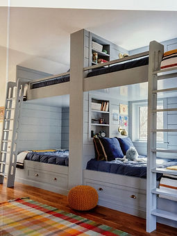 Custom millwork built in bunk beds in Falmouth bunk room by local interior designer
