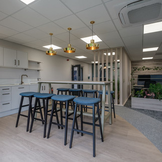 Boluda towage breakout area and kitchette, head office, flooring mix and curve detail