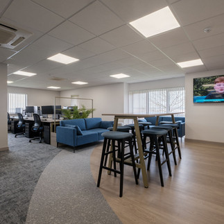 Boluda towage breakout area and desk banks, head office, view of wider office