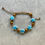 Miniatura: Bracciale in ceramica stelline azzurre e legno