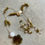 Miniatura: Collana perline in pietra e fiore in ceramica