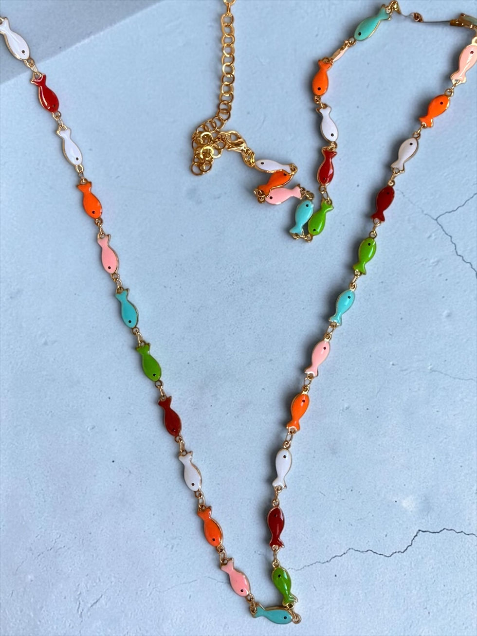 Miniatura: Collana lunga  pesci piccoli smaltata,