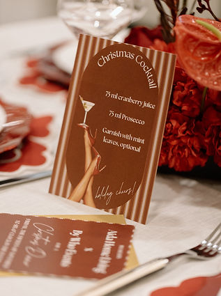 Elegant Christmas event invitation with gold foil details and calligraphy, designed for a luxury holiday celebration.