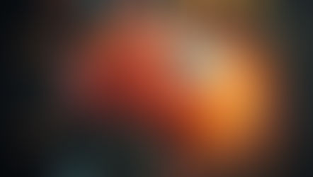 A vibrant, artistic depiction of a brain with colourful, abstract objects and letters exploding from it against a dark background.