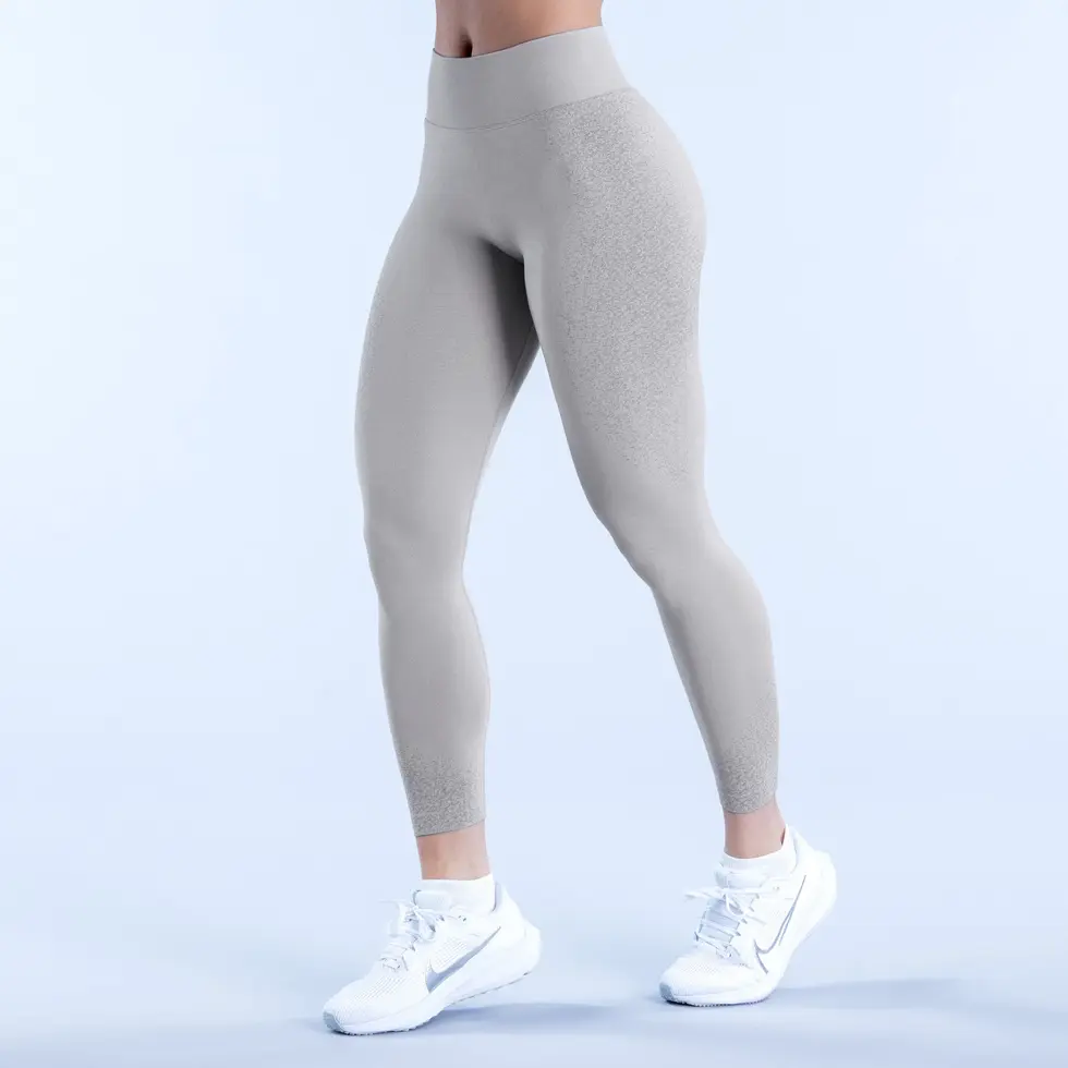 Close-up of Coconut Cream leggings – sculpting leg fit with scrunch detail – white seamless activewear by BÜNDA BUTT
