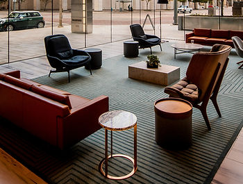 Hotel furniture upholstery repair - professional leather restoration services for hospitality industry