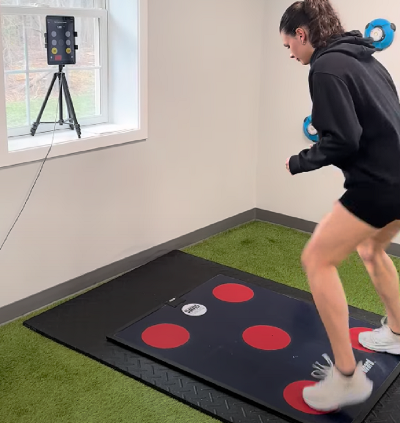 Athlete performing Quick Board reaction drills at Analytics for Athletes in Medford, NJ to build precision, defensive speed, and measurable performance improvements.