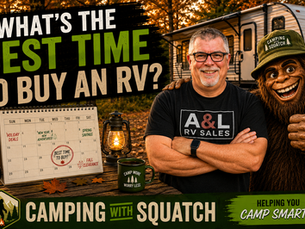 Joe Stanford Camping with Squatch standing beside a travel trailer at a Tennessee campsite — best time to buy an RV guide 2026