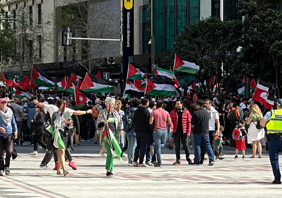 Members of the Syrian Arabic Community in New Zealand joining an Auckland rally to support Palestine and condemn IDF attacks on civilians in Gaza.
