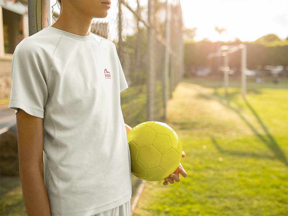custom-soccer-jerseys-boy-holding-the-ball-a16393 (1).png