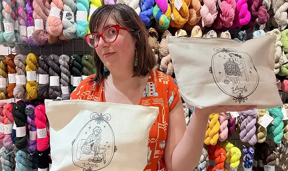 woman holding two knitting bags