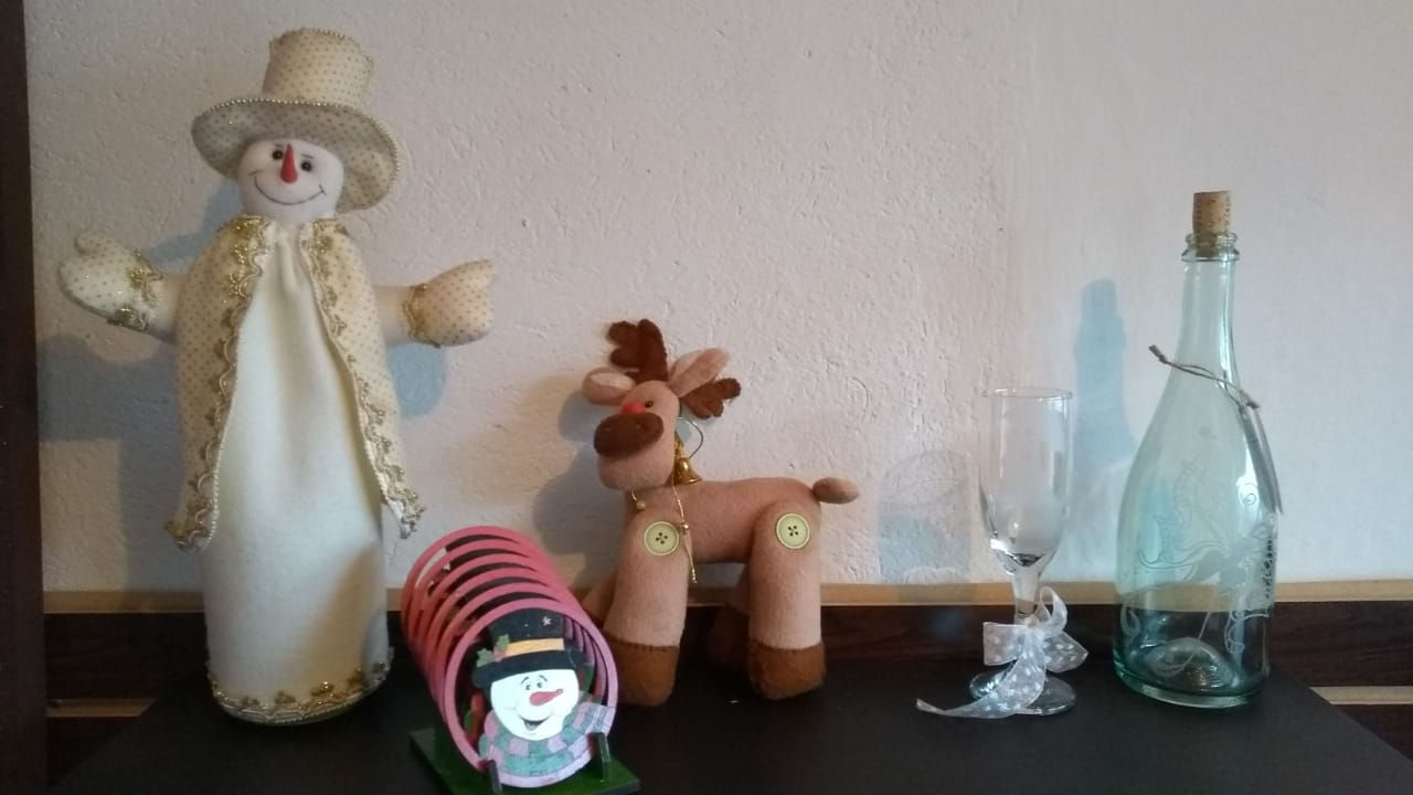 Muñeco de nieve y reno