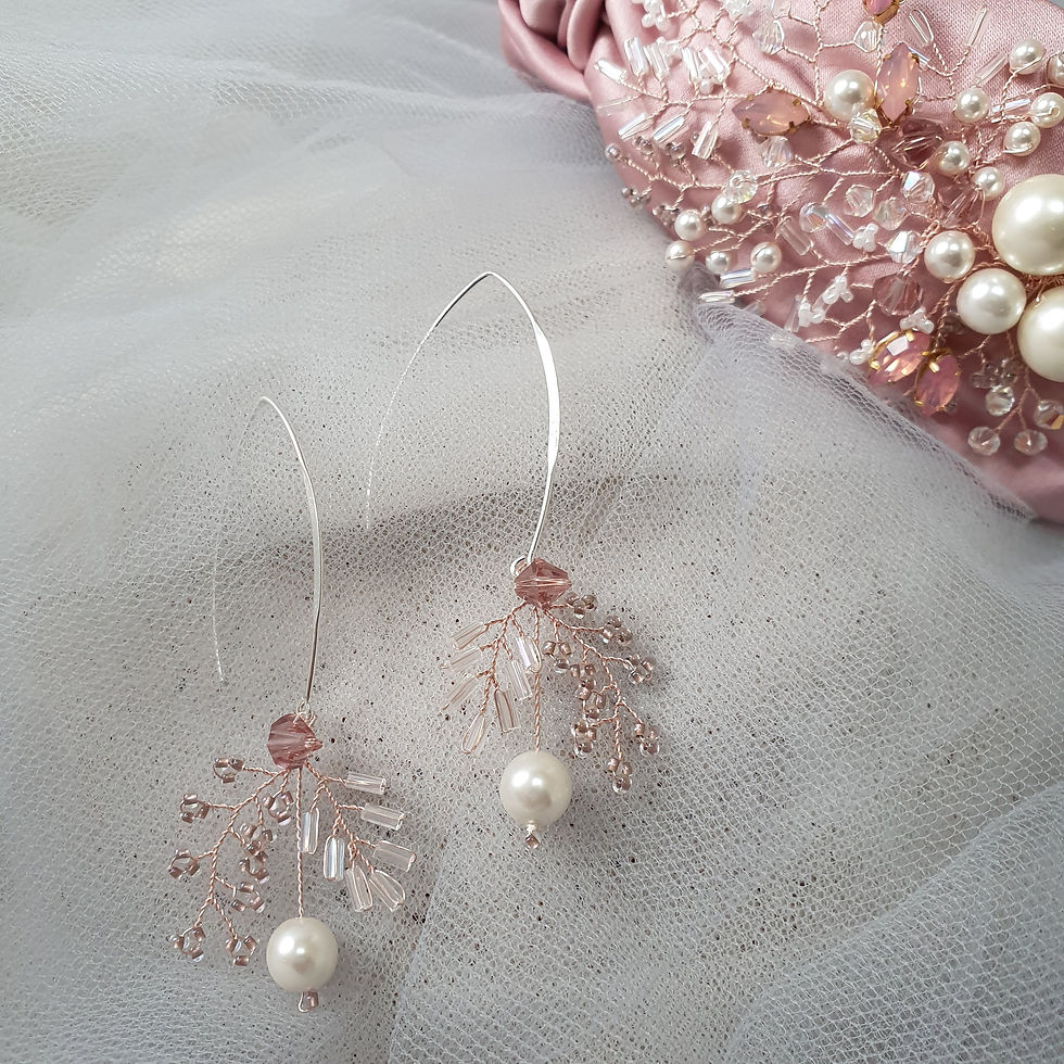 Thumbnail: blush / rose coloured hand beaded bridal earrings on modern long hook drop