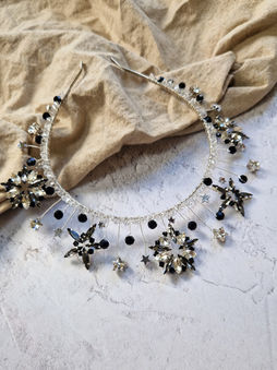 bespoke black tie event headpiece with black and white stars and black crystal beadwork