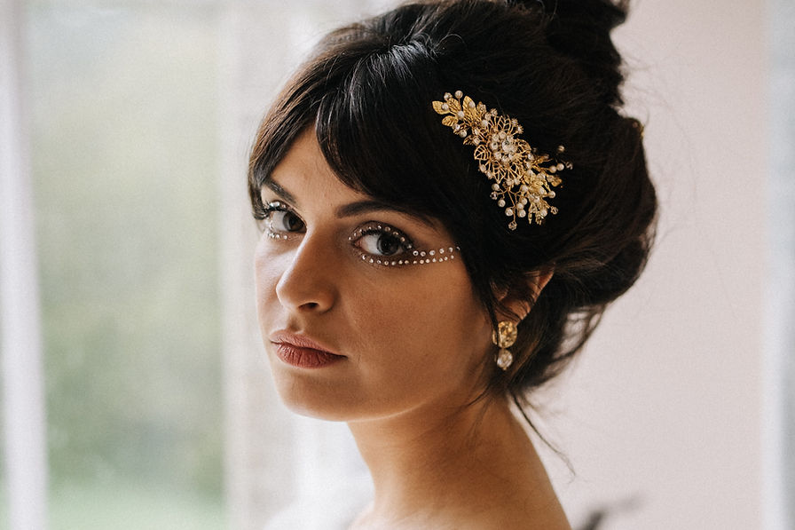 bride wearing one of a kind reworked vintage wedding headpiece and bespoke bridal earrings