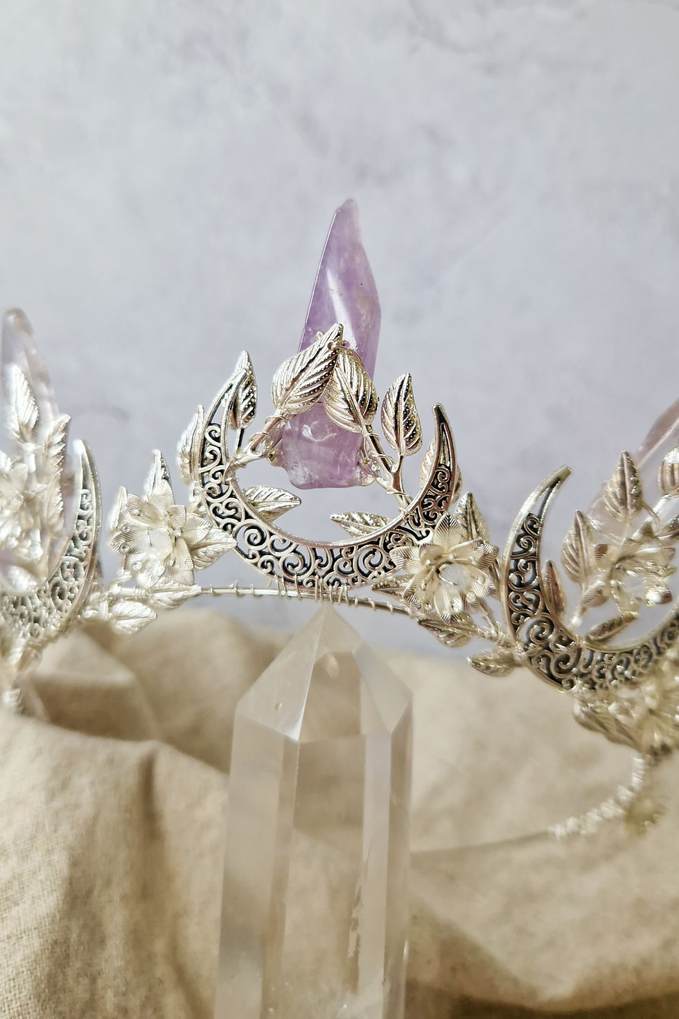 Thumbnail: Filigree moon and opal-centred flowers on silver tiara style alternative bridal crown
