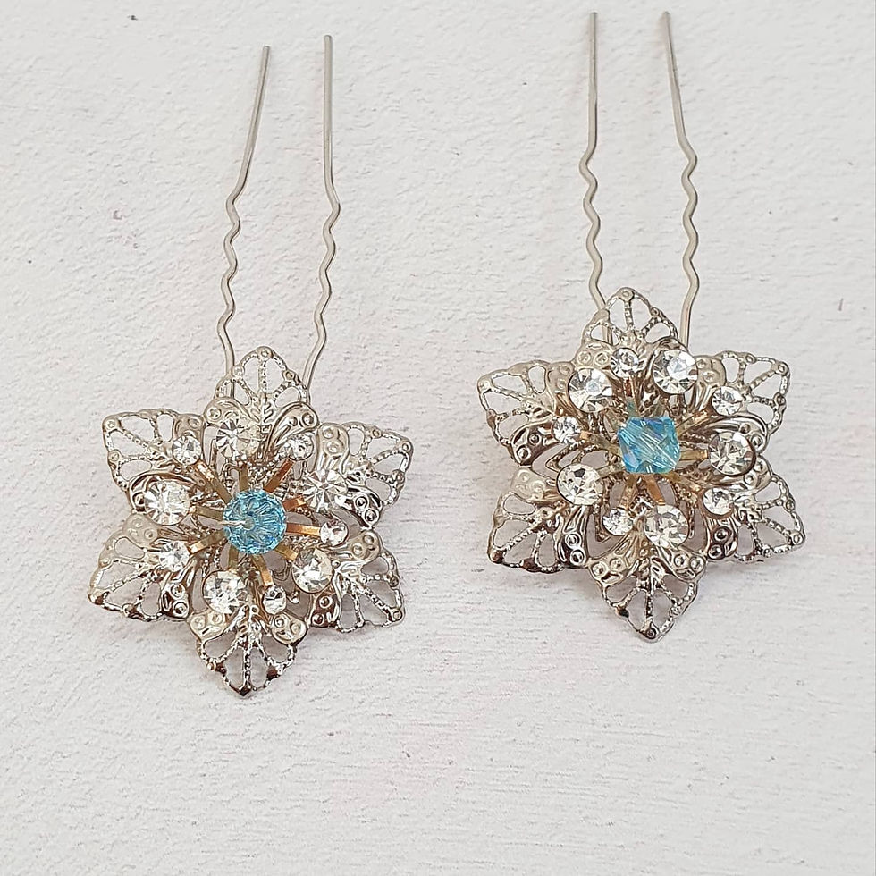 Thumbnail: wintery blue and silver bridal snowflake / flower filigree hair pins.