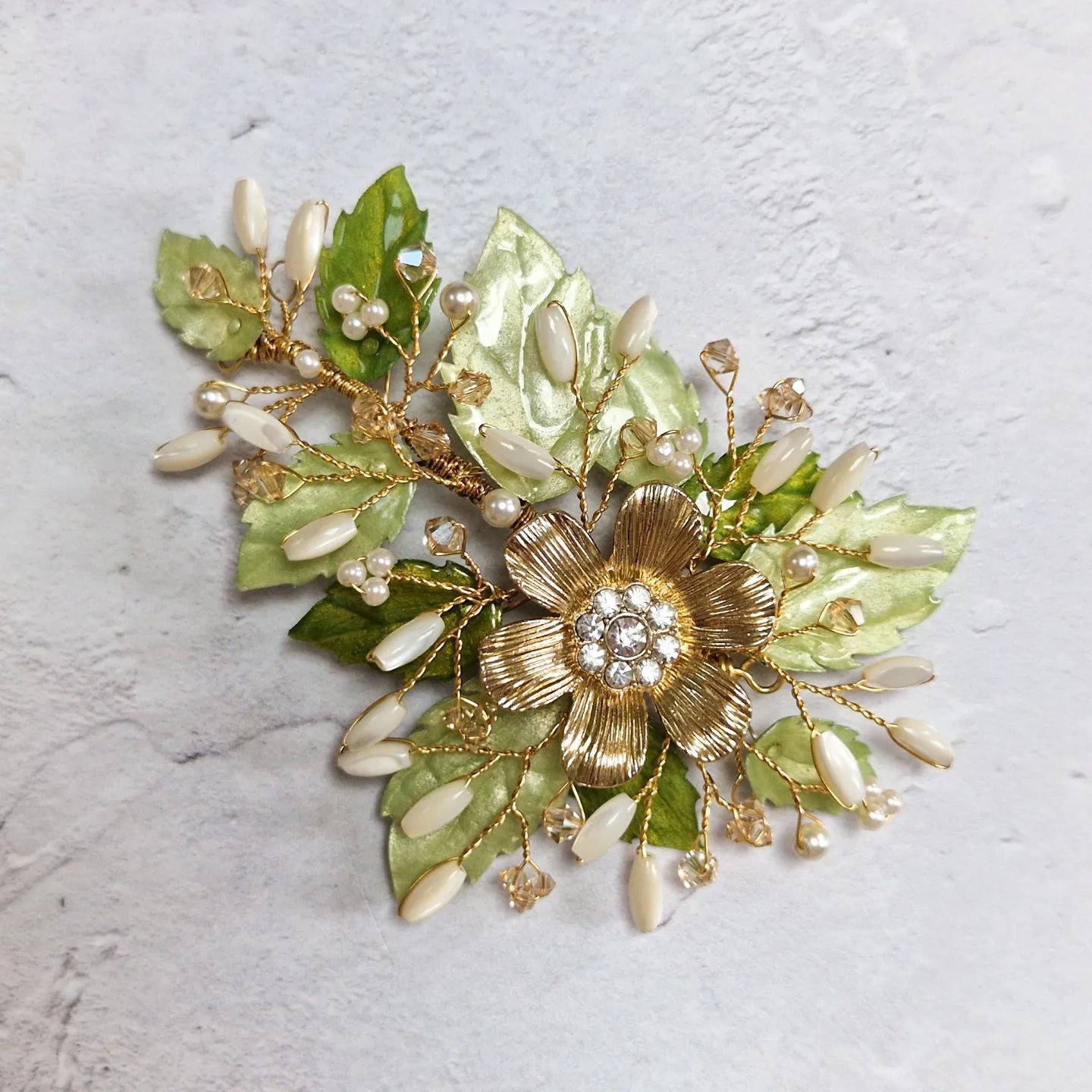 spring wedding bridal headpiece using reworked flower from a preloved vintage necklace