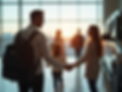 A-family-arriving-at-the-airport-greeted-by-a-van-rental-representative-holding-a-sign.png
