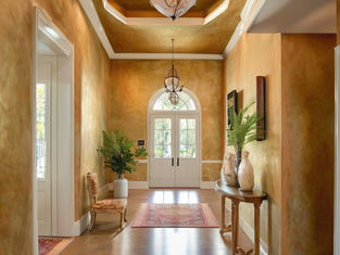 Elegant entryway with a Venetian plaster fisnish